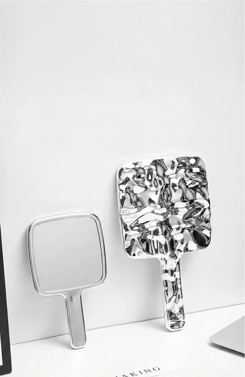 Ins-style retro handheld makeup mirror with a premium handle, portable for carrying and touch Silver M-2