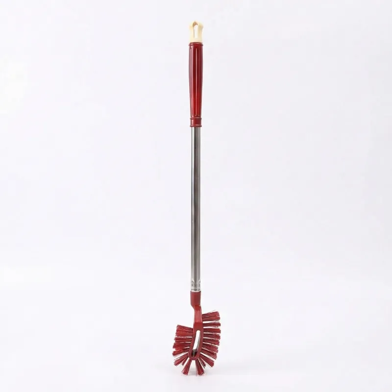 Long-handled toilet brush for cleaning hard-to-reach areas in the bathroom; a household cleaning tool with soft bristles