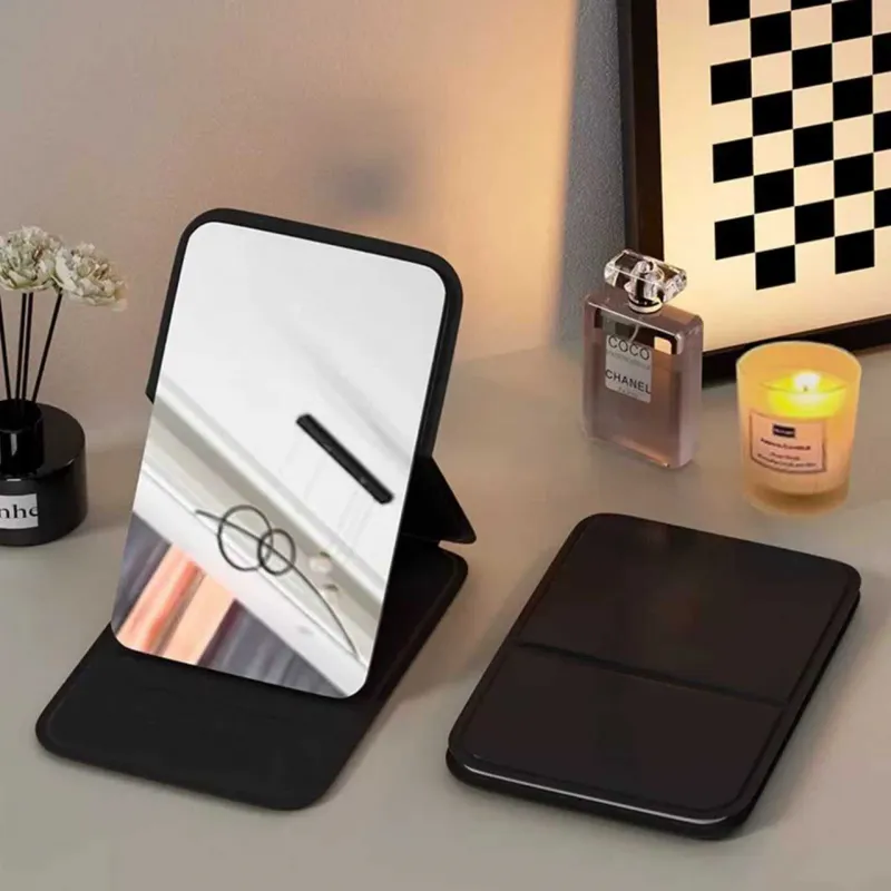 Portable folding mirror for makeup, high-definition desktop mini mirror for girls, can stand, small personal mirror Black  M-2