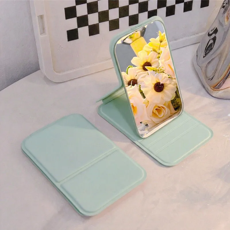 Portable folding mirror for makeup, high-definition desktop mini mirror for girls, can stand, small personal mirror Green M-2